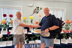 Southtown Dahlia Club, Chicago South Suburbs,  Heinz Pieniak (left) being congratulated by Jim Kassner (right)